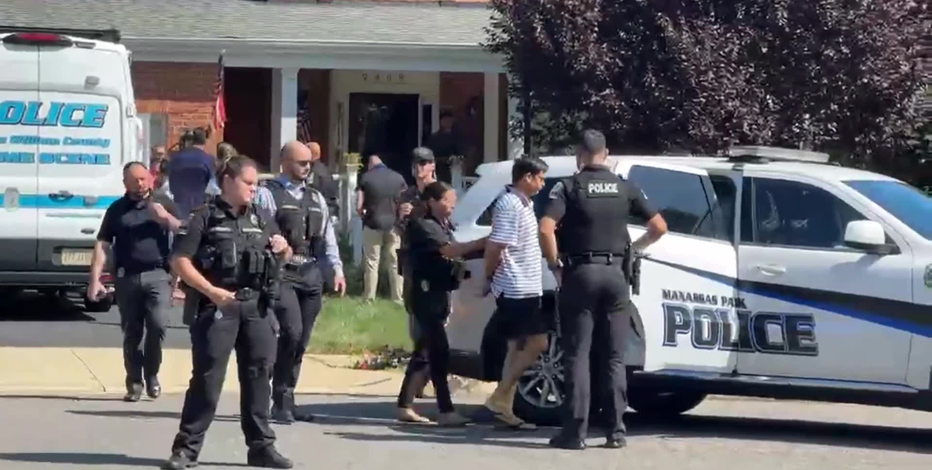 WATCH: Husband of missing Manassas Park woman led out of home in handcuffs