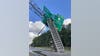 Truck bed slams into highway sign on I-64 in Virginia