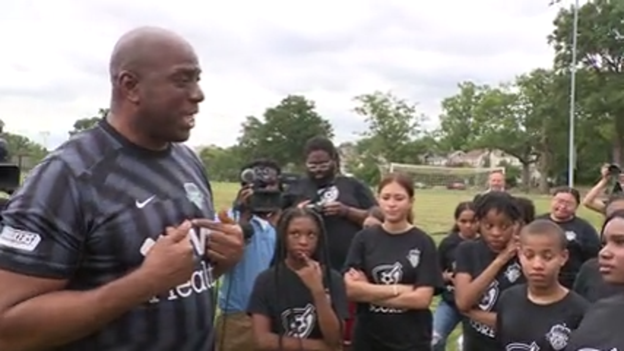 Magic Johnson visits DC school, talks new role with Washington Spirit