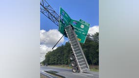 Truck bed slams into highway sign on I-64 in Virginia