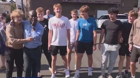 Students at Virginia high school surprise custodian with dream car