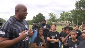 Magic Johnson visits DC school, talks new role with Washington Spirit