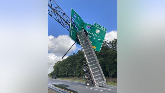 Truck bed slams into highway sign on I-64 in Virginia