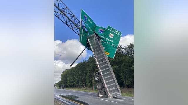 Truck bed slams into highway sign on I-64 in Virginia