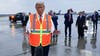 Trump hops into garbage truck during campaign event in response to Biden remark