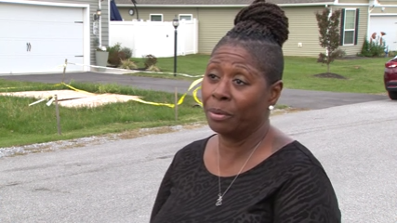 West Virginia woman struggles with massive sinkhole in front yard