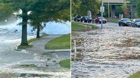 Man rescued from vehicle after water main break floods DC roadway