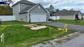 West Virginia woman struggles with massive sinkhole in front yard