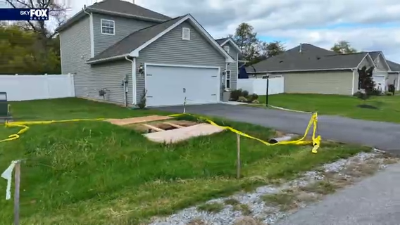 West Virginia woman struggles with massive sinkhole in front yard