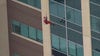 Holiday heroes rappel down Virginia children’s hospital to surprise young patients at windows