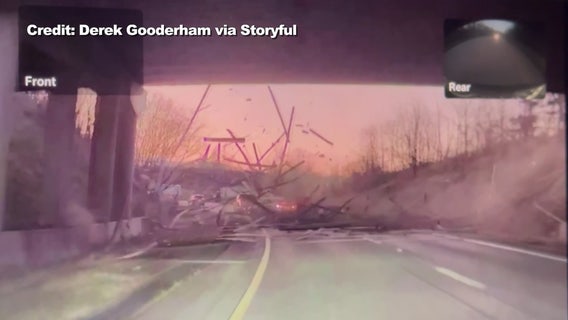 Video captures lumber load crashing into car on Pennsylvania highway