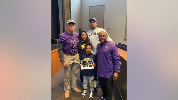 DC high school student joins University of Michigan Wolverines on National Signing Day