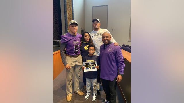 DC high school student joins University of Michigan Wolverines on National Signing Day