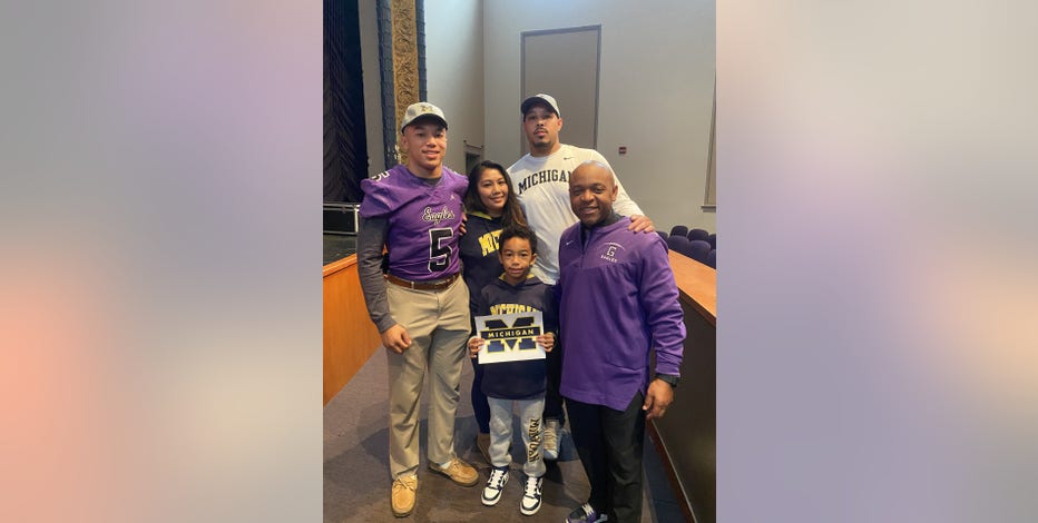 DC high school student joins University of Michigan Wolverines on National Signing Day