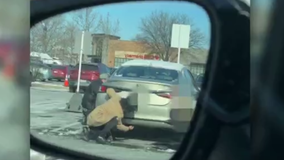 Police searching for 2 men accused of robbing woman in Gaithersburg parking lot