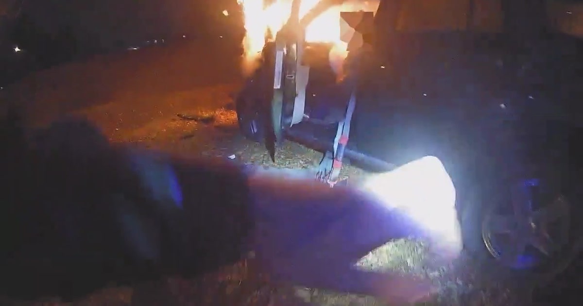 Dramatic rescue from fiery vehicle crash captured on Maryland police ...