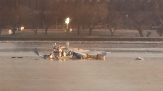 55 victims positively identified following deadly DC plane crash; aircraft to be lifted Monday