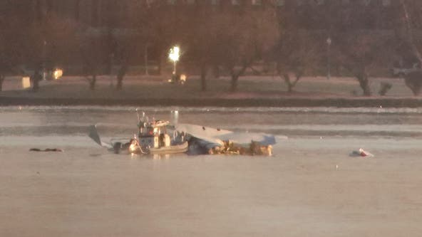 55 victims positively identified following deadly DC plane crash; aircraft to be lifted Monday