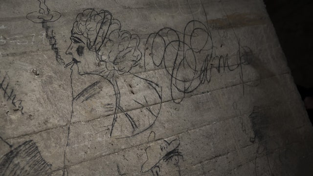 Century-old graffiti under Lincoln Memorial may depict silent-film star Theda Bara
