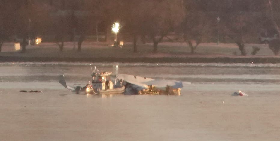 55 victims positively identified following deadly DC plane crash; aircraft to be lifted Monday