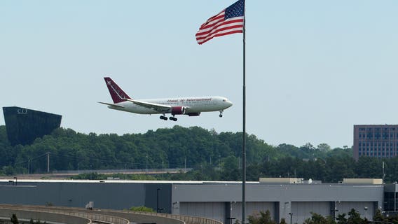 White South African refugees arrive at Dulles