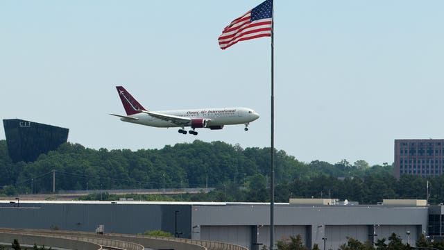 White South African refugees arrive at Dulles