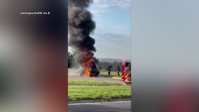 Plumbs of black smoke over Gravelly Point caused by vehicle fire