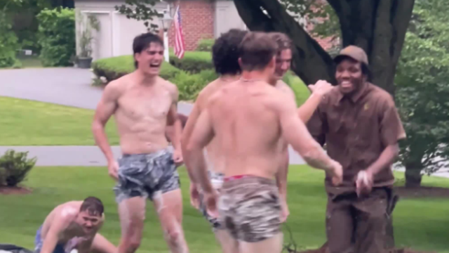 WATCH: UPS driver dives into fun on Slip ‘N Slide