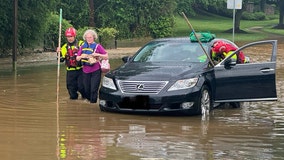 20 rescued from building, dozens from vehicles as storms flood DMV