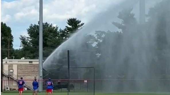 Firefighter ends baseball game with fire hose after ball hits his car, team says