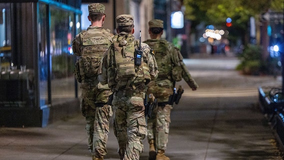 Some National Guard troops in DC now armed as Trump takeover continues