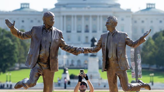 Statue of Donald Trump and Jeffrey Epstein holding hands appears on National Mall