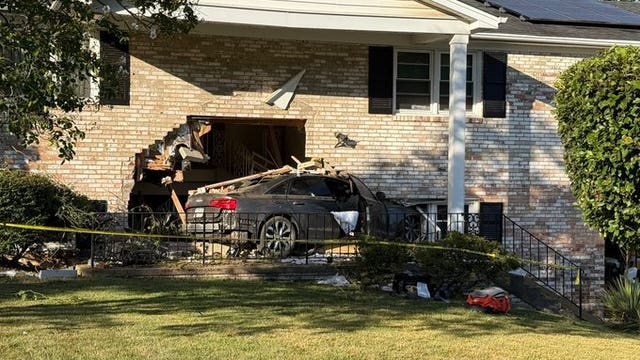 Car plows into front of home in Prince George County; driver hospitalized