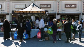 Federal workers line up for food assistance as shutdown enters third week