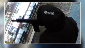 Police release photos of suspect who allegedly threatened store employees with rifle