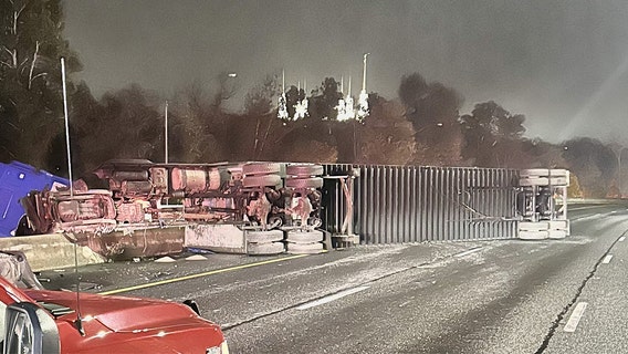 Overturned tractor-trailer causes major delays on I-495 in Chevy Chase