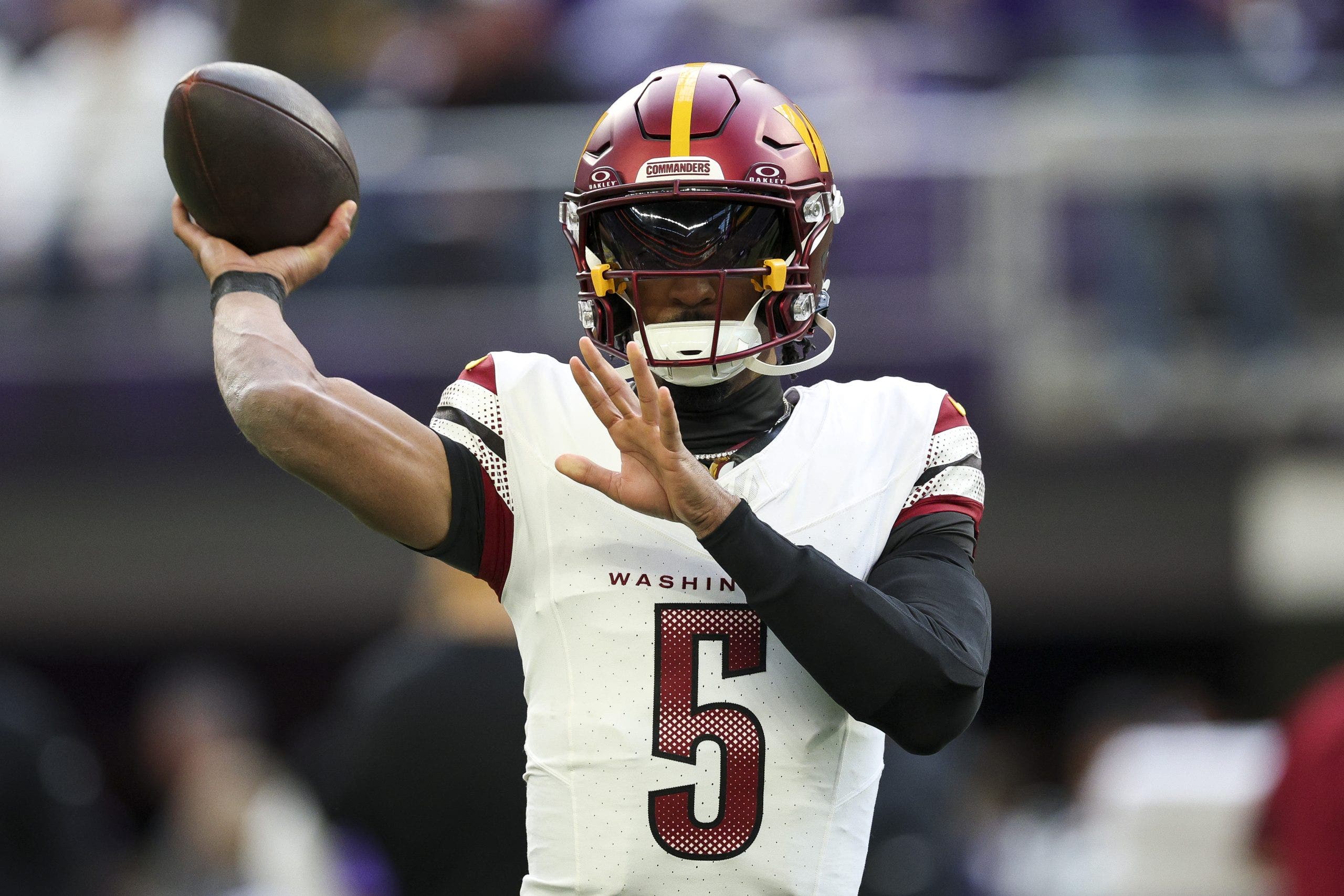 Commanders' QB Jayden Daniels reinjures elbow, exits game against Vikings