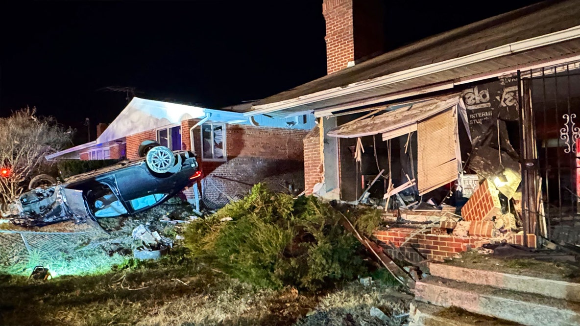 Vehicle overturns, strikes 2 homes in southeast DC
