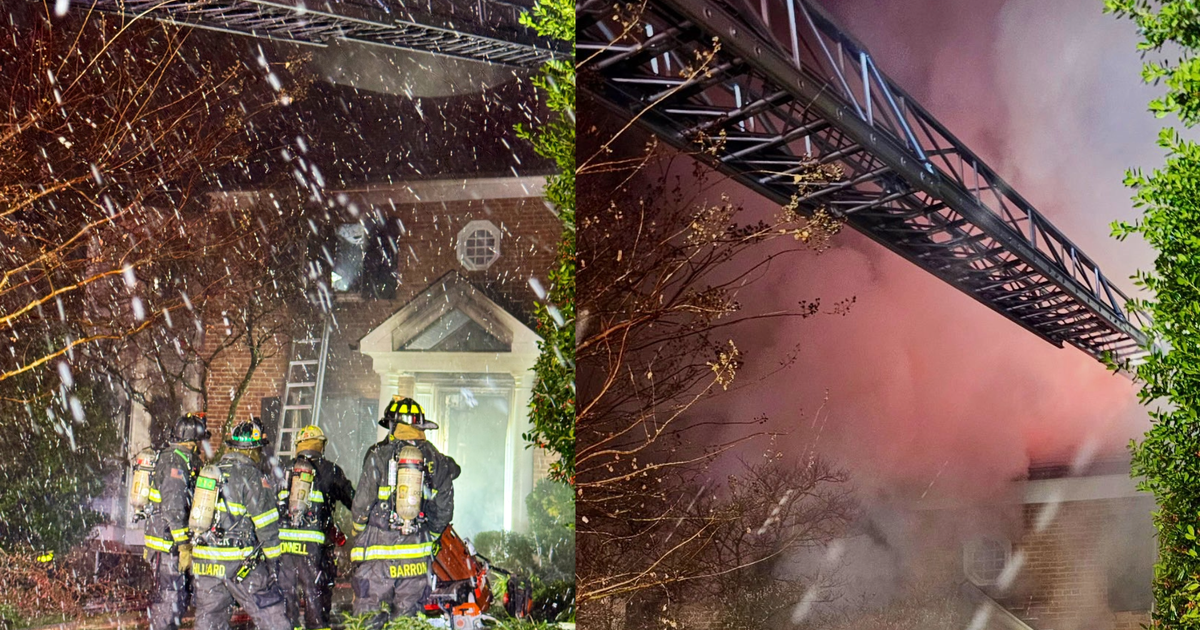 Firefighters battle snowy multi-level house fire in Northwest DC | FOX 5 DC