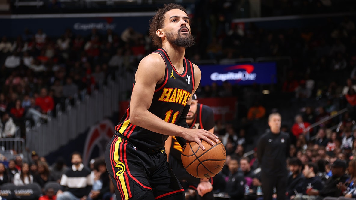 Trae Young posts photo of new Washington Wizards jersey as trade made official