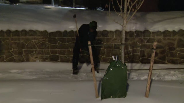 Workers, volunteers push to clear ice and snow from DC streets