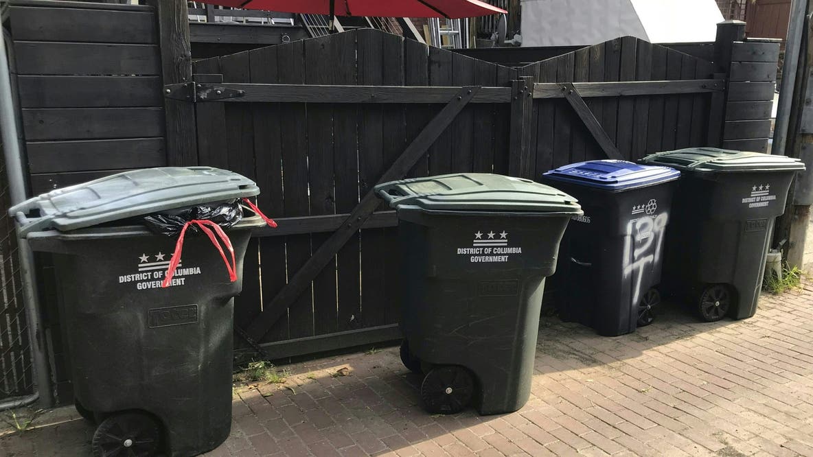 DPW investigating after viral video of trash collector tossing cans