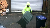 DPW investigating after viral video of trash collector tossing cans