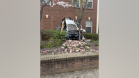 No injuries reported after car plows through building in Arlington