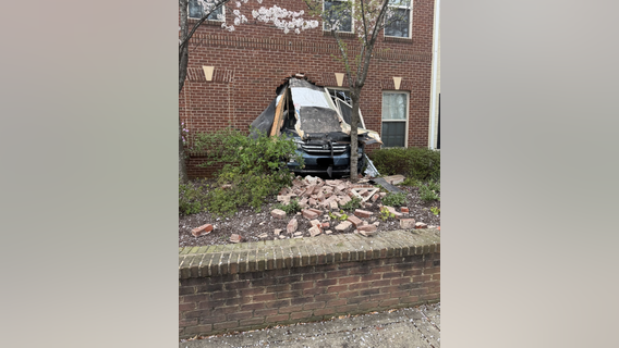 No injuries reported after car plows through building in Arlington