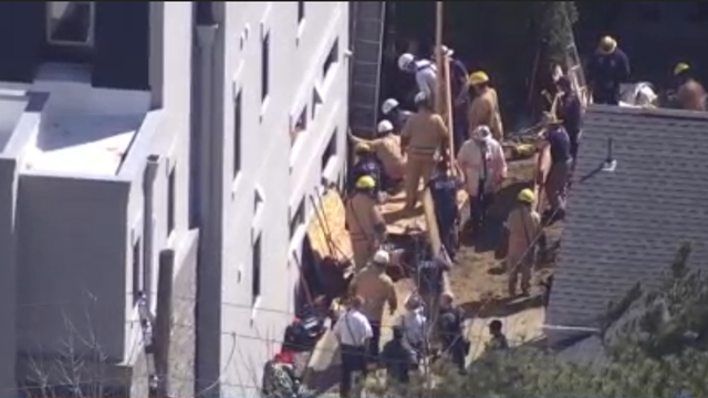 2 construction workers rescued after trench collapse in Bethesda expected to survive
