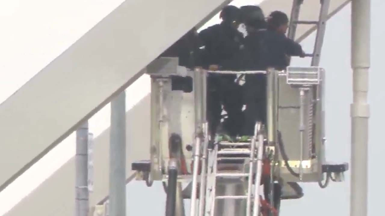 Protester comes down from Frederick Douglass Memorial Bridge after nearly a week