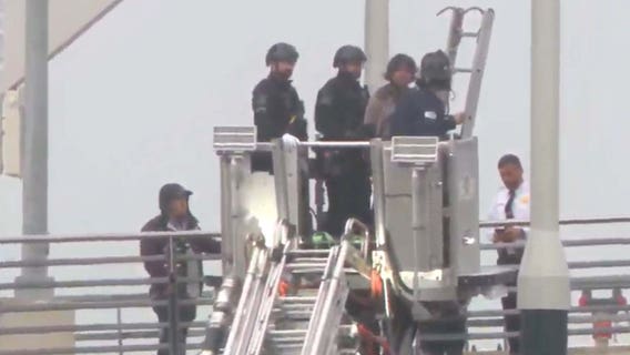 Protester comes down from Frederick Douglass Memorial Bridge after nearly a week