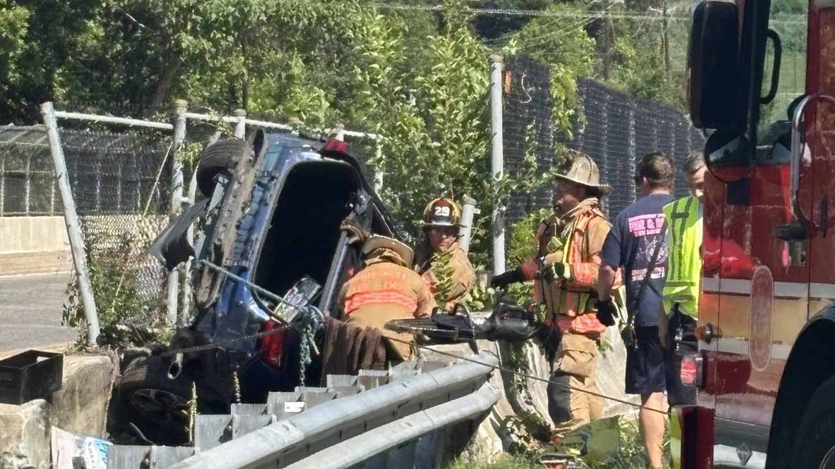 Crash sends vehicle hanging off side of bridge in Germantown