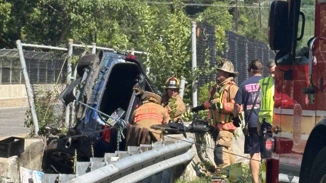 Crash sends vehicle hanging off side of bridge in Germantown